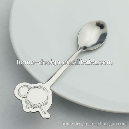 tea spoon with tea pot shape